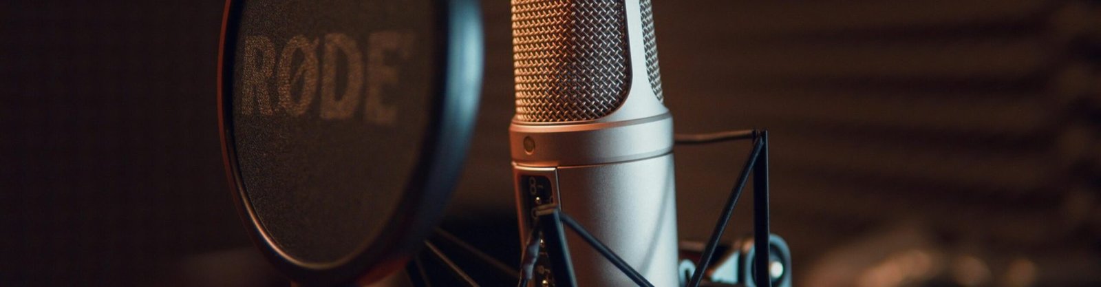 pexels-photo-3783471-3783471 Silver Dynamic Microphone on Black Microphone Stand